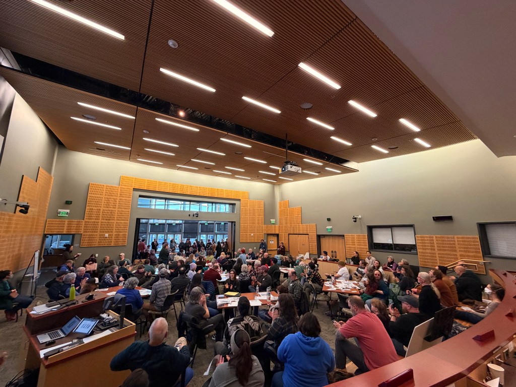Photo of Olympia city hall filled with people gathered for the Community Priorities Forum on January 24, 2026. 